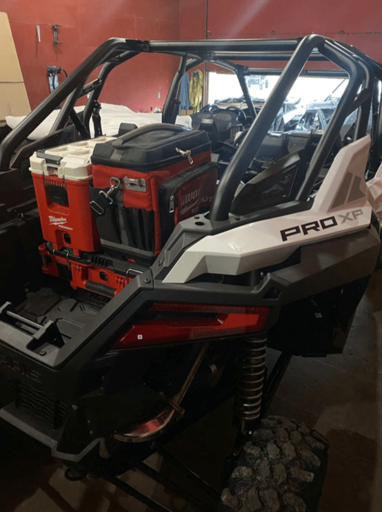 Polaris RZR PRO XP / Turbo R Packout Mount by AJK Offroad Right Side View with three Kits and one Cooler