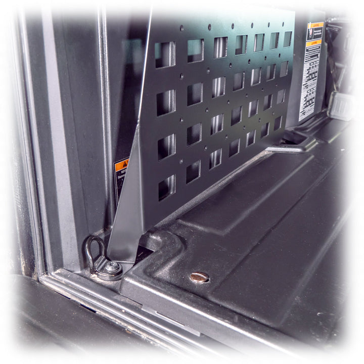 Installed cargo molle panels on an adventure UTV