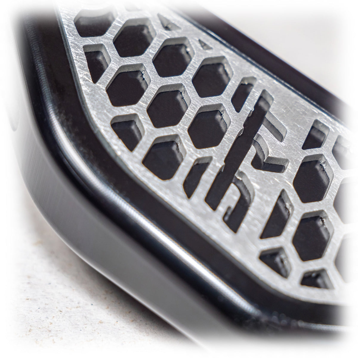 DRT Can Am Maverick R Steering Wheel Adjustment Lever Brand in handle close up