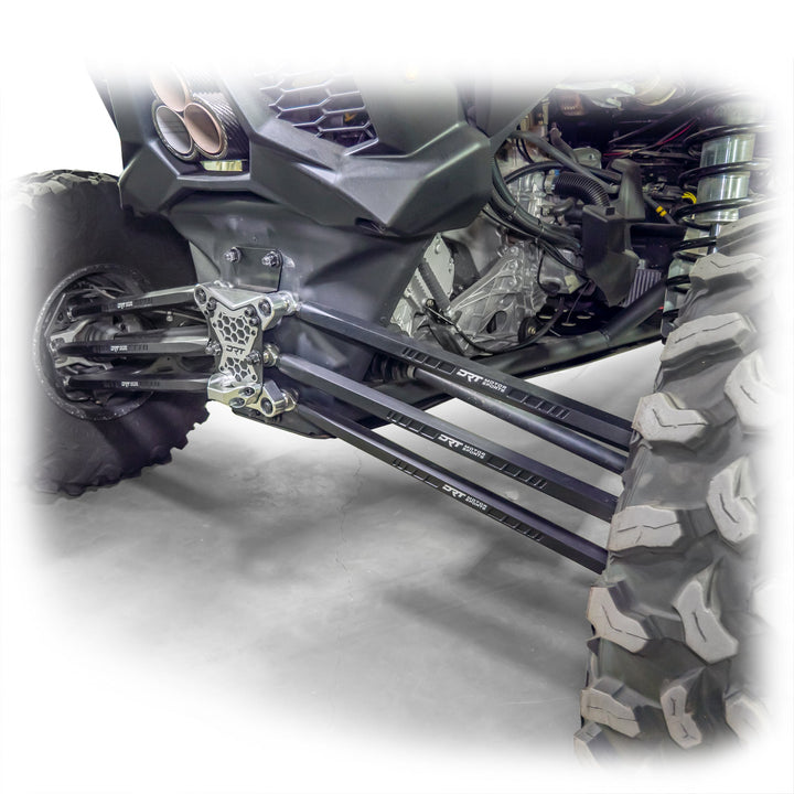 Installed barrel radius rod kit under rear control arm of Maverick X3 on both wheels