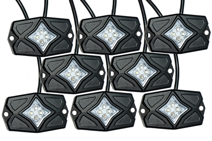 Seven UTV Stereo black LED rock light pods arranged in a grid