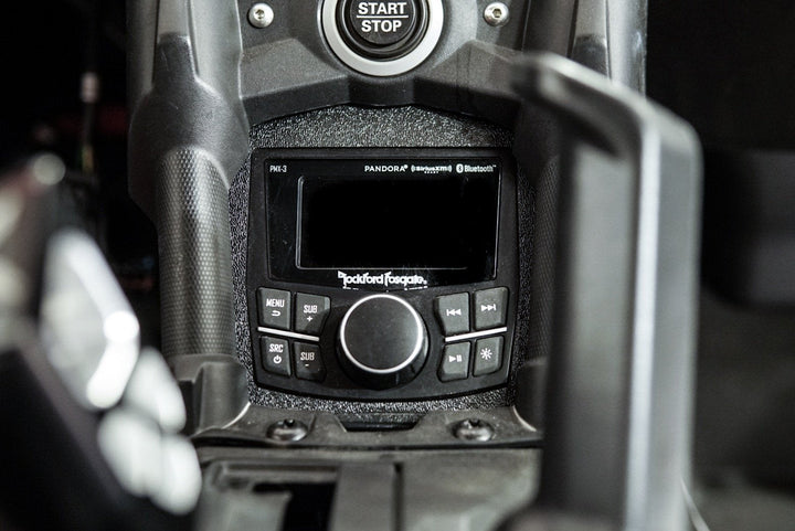 Rockford Fosgate PMX-3 digital media receiver installed in a vehicle dashboard