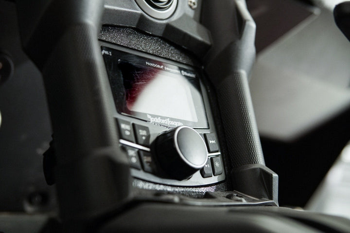 Rockford Fosgate PMX-3 digital media receiver mounted in a vehicle dashboard