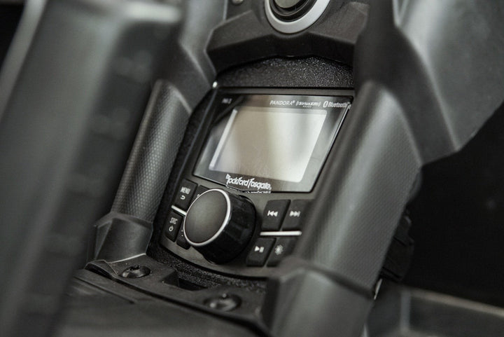 Rockford Fosgate digital media receiver installed in a vehicle dashboard