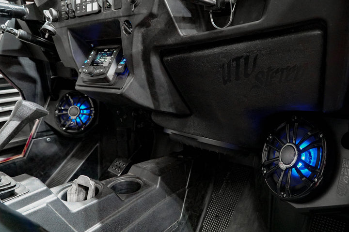UTV Stereo audio system with blue LED speakers installed in vehicle dashboard