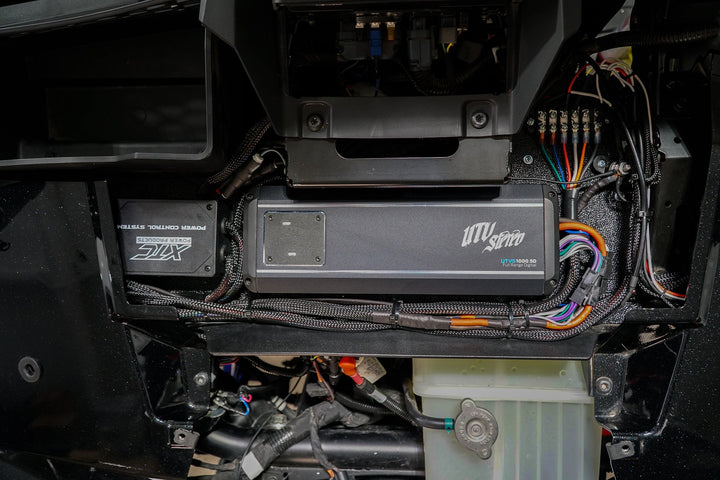 UTV Stereo UTVS1000 5D amplifier and XTC power control system installed in vehicle chassis