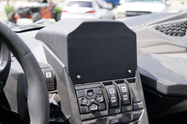 UTV Stereo dash mount installed in a vehicle center console