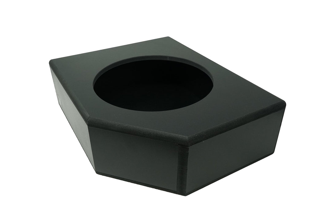 Black carpeted subwoofer enclosure box with a single circular speaker cutout