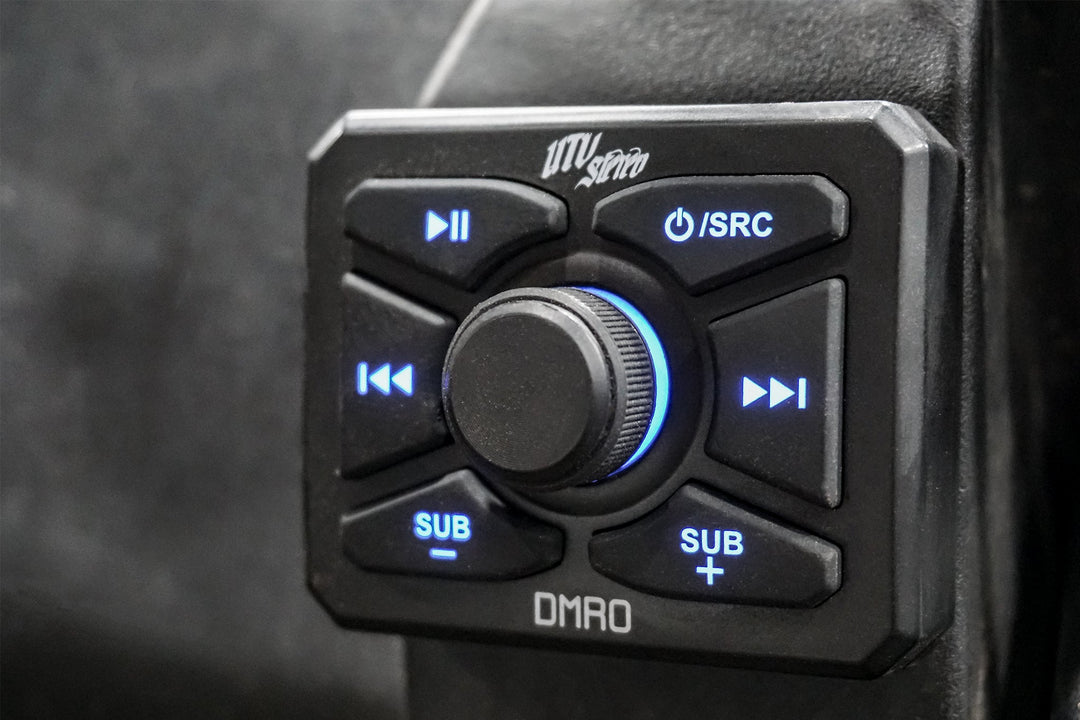 UTV Stereo DMRO media controller with backlit buttons and central volume knob
