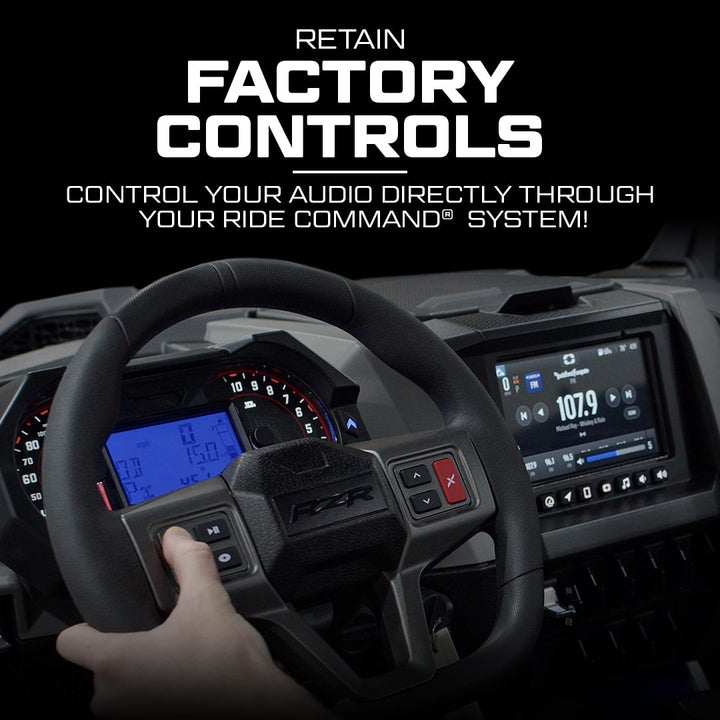 Hand on steering wheel controlling audio through Ride Command system