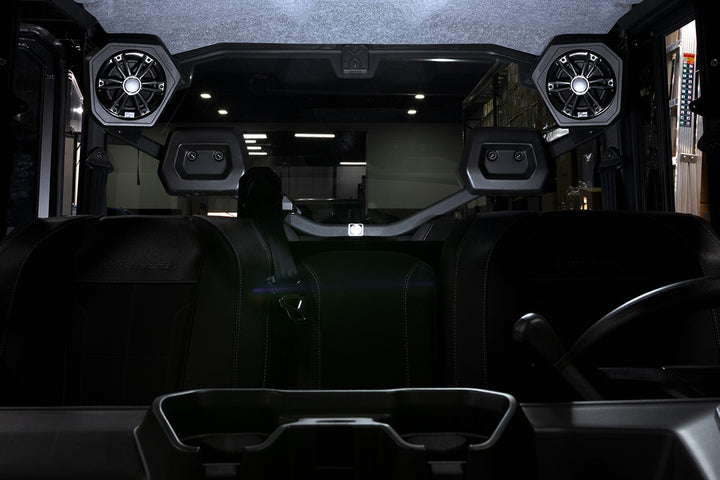 Can-Am off-road vehicle interior with overhead mounted audio speakers