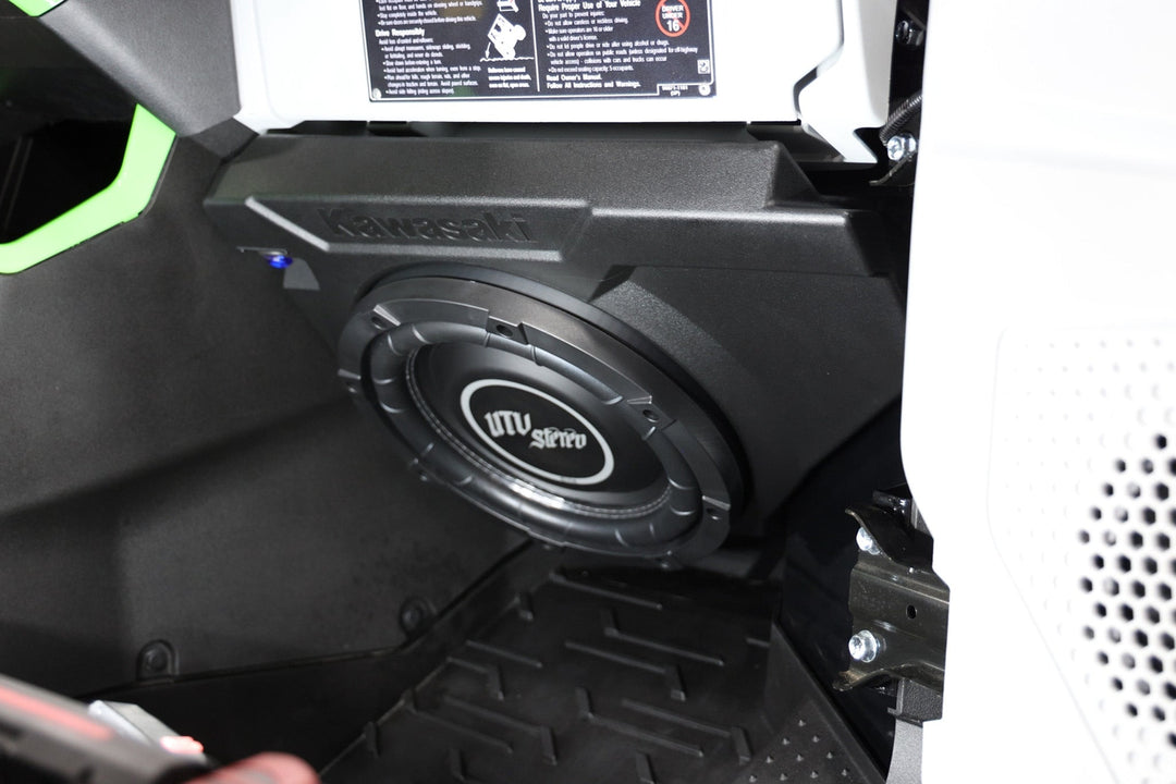 UTV Stereo subwoofer installed in a Kawasaki vehicle