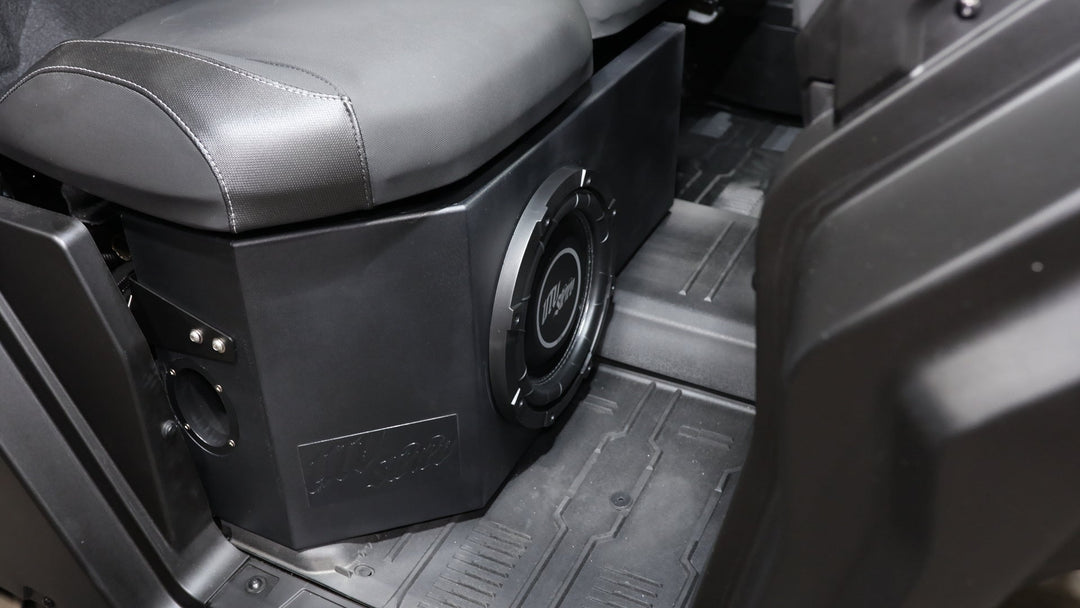 UTV Stereo subwoofer enclosure installed under vehicle seat