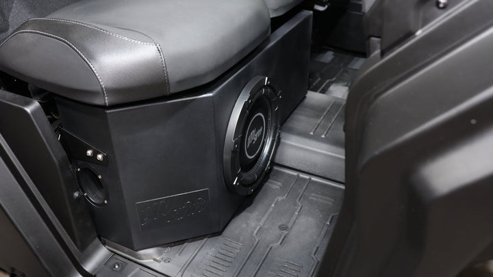 UTV Stereo subwoofer enclosure installed under vehicle seat
