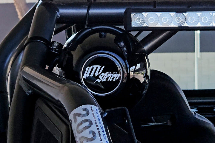 UTV Stereo speaker mounted on a roll cage