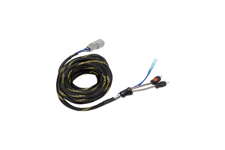 Coiled black and yellow braided wiring harness with grey connector and RCA plugs