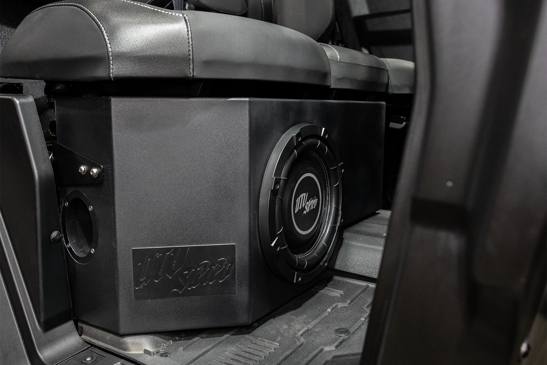 UTV Stereo subwoofer enclosure installed under vehicle seat