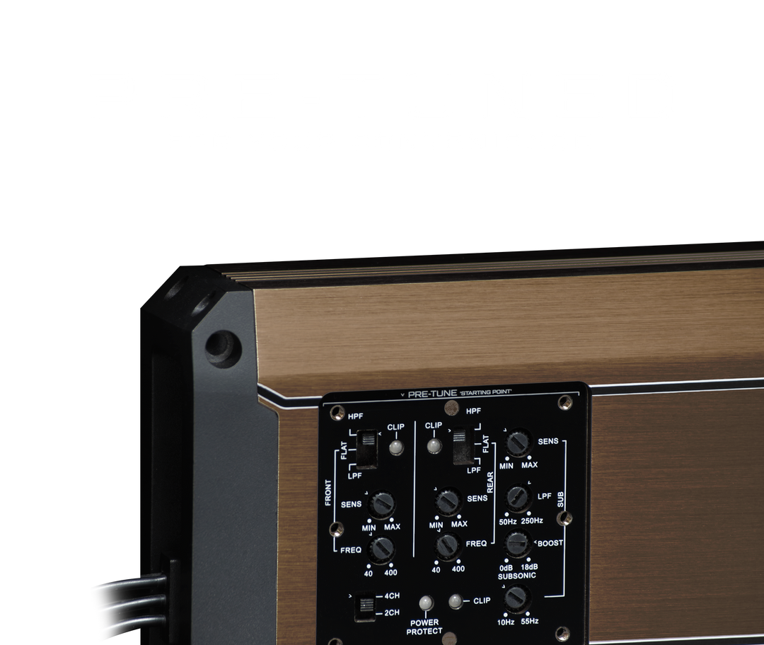 Close up of car audio amplifier control panel with adjustment knobs and switches