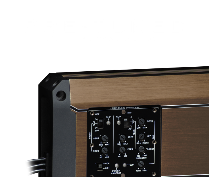 Close up of car audio amplifier control panel with adjustment knobs and switches