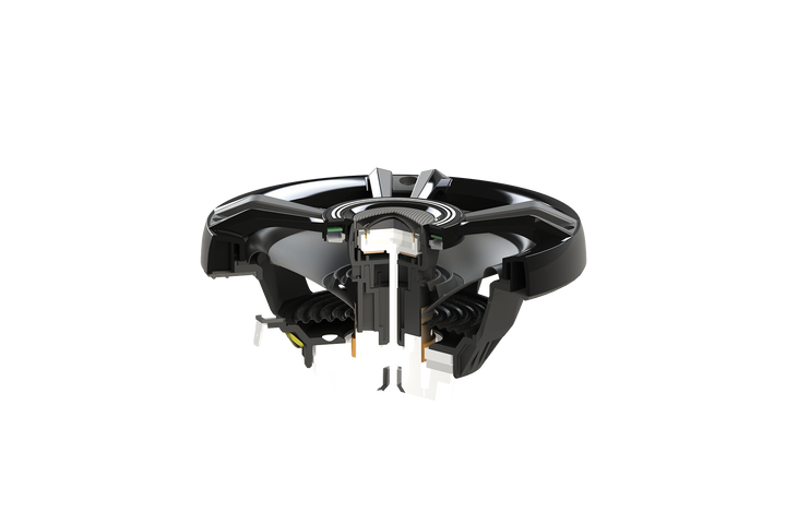 Cross section view of a black car audio speaker showing internal components