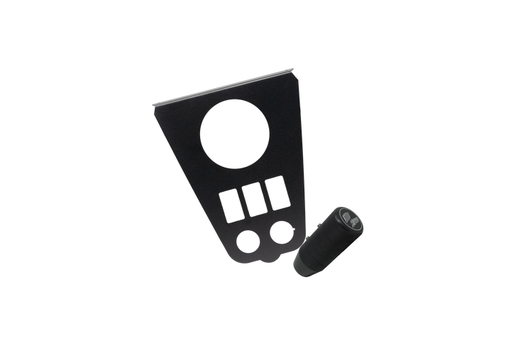 Black metal switch panel with gauge cutout and cylindrical textured knob