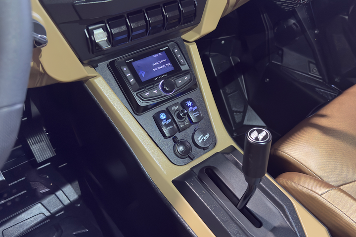 UTV Stereo media receiver and switch panel installed in vehicle center console