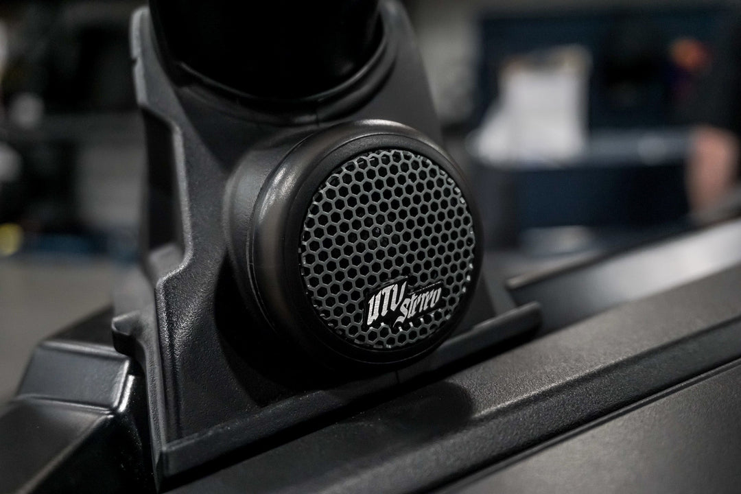 UTV Stereo tweeter speaker mounted on a black vehicle dash