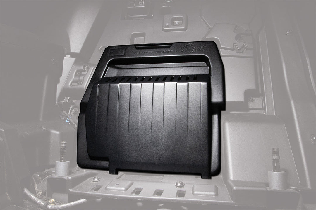 UTV Stereo black plastic battery cover installed in vehicle