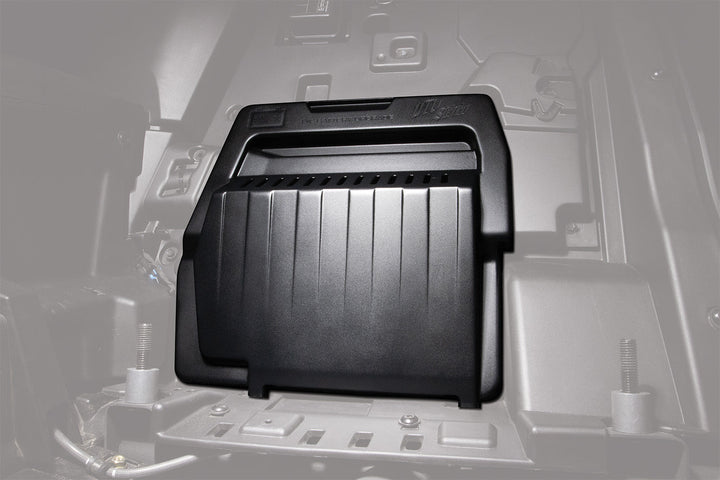 UTV Stereo black plastic battery cover installed in vehicle