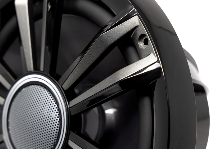UTV Stereo black and silver speaker grille close up