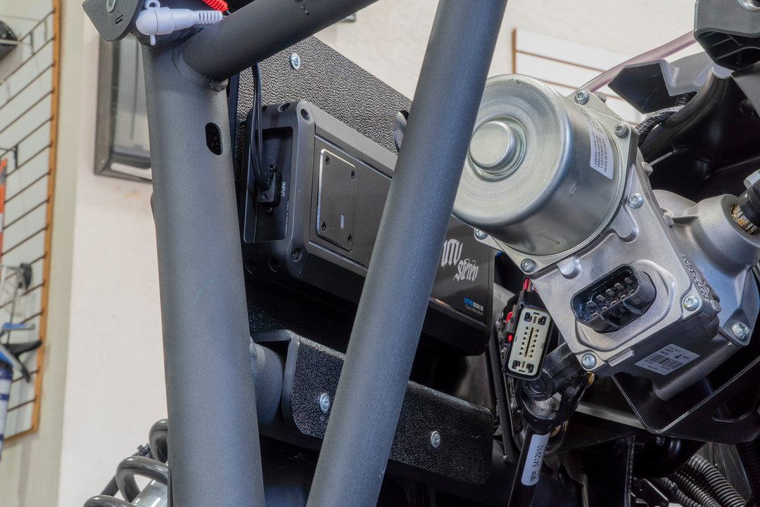 UTV Stereo amplifier mounted on a vehicle roll cage frame