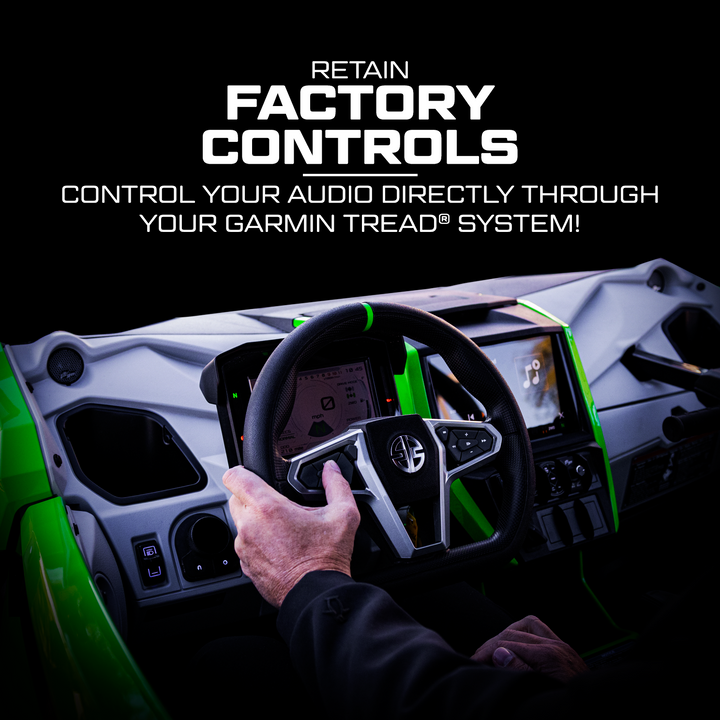 Driver using steering wheel controls to operate Garmin Tread audio system in a powersports vehicle