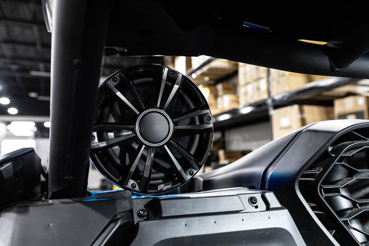 UTV Stereo black circular speaker mounted on a vehicle roll cage