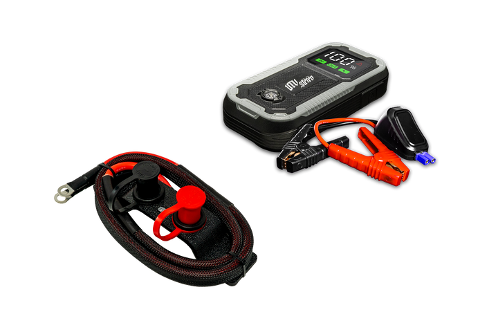 UTV Stereo portable jump starter battery pack with jumper cables and remote charging terminal