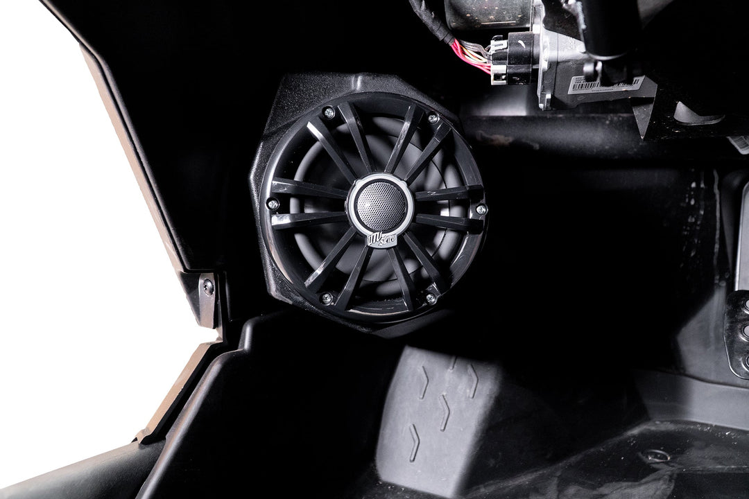 UTV Stereo speaker mounted in a vehicle interior panel