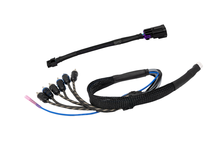 Vehicle audio wiring harness with RCA connectors and black braided cable sleeve